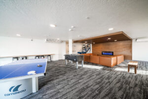 Apartment Community Game Room with Ping Pong Table and Foosball