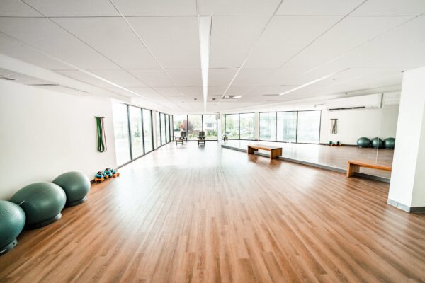 fitness room with yoga balls, bands, and dumbbells
